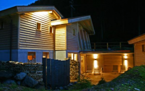  Hüttenhotel Husky Lodge  Муотаталь